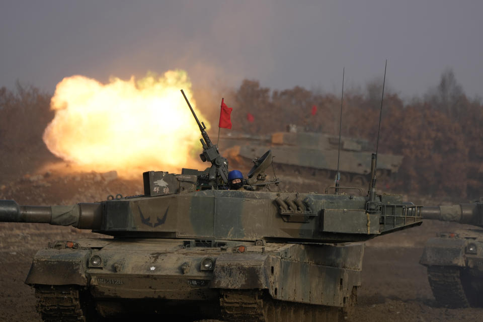 Japanese Ground-Self Defense Force (JGDDF) Type 90 tanks participate in the annual exercise at the Minami Eniwa Camp Tuesday, Dec. 7, 2021, in Eniwa, Japan's northern island of Hokkaido. Dozens of tanks are rolling over the next two weeks on Hokkaido, a main military stronghold for a country with perhaps the world's most little known yet powerful army. (AP Photo/Eugene Hoshiko)