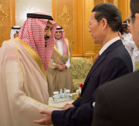 Saudi Arabia's King Salman bin Abdulaziz Al Saud shakes hands with Chinese Vice Premier Zhang Gaoli, in Jeddah, Saudi Arabia, August 24, 2017. Bandar Algaloud/Courtesy of Saudi Royal Court/Handout via REUTERS