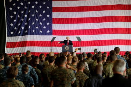 FILE PHOTO: U.S. President Donald Trump delivers remarks to U.S. military personnel at Naval Air Station Sigonella following the G7 Summit, in Sigonella, Sicily, Italy, May 27, 2017. REUTERS/Darrin Zammit Lupi/File Photo