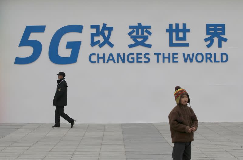 FILE PHOTO: A sign for the World 5G Exhibition is seen in Beijing