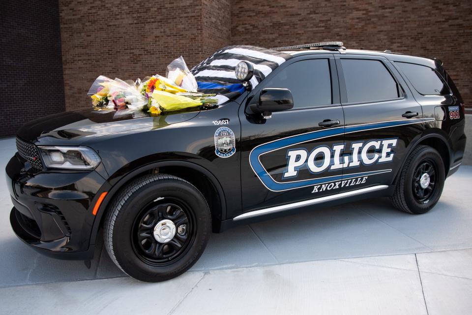 A Knoxville Police Department patrol car memorial is set up outside of the Public Safety Complex in honor of Wisbens Antoine on Monday, Feb. 26, 2024.