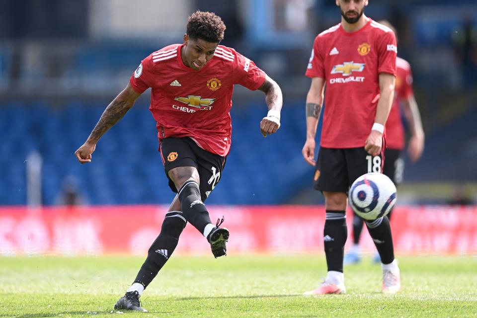 Manchester United's English striker Marcus Rashford has this freekick saved during the English Premier League football match between Leeds United and Manchester United at Elland Road in Leeds, northern England on April 25, 2021. - RESTRICTED TO EDITORIAL USE. No use with unauthorized audio, video, data, fixture lists, club/league logos or 'live' services. Online in-match use limited to 120 images. An additional 40 images may be used in extra time. No video emulation. Social media in-match use limited to 120 images. An additional 40 images may be used in extra time. No use in betting publications, games or single club/league/player publications. (Photo by Laurence Griffiths / POOL / AFP) / RESTRICTED TO EDITORIAL USE. No use with unauthorized audio, video, data, fixture lists, club/league logos or 'live' services. Online in-match use limited to 120 images. An additional 40 images may be used in extra time. No video emulation. Social media in-match use limited to 120 images. An additional 40 images may be used in extra time. No use in betting publications, games or single club/league/player publications. / RESTRICTED TO EDITORIAL USE. No use with unauthorized audio, video, data, fixture lists, club/league logos or 'live' services. Online in-match use limited to 120 images. An additional 40 images may be used in extra time. No video emulation. Social media in-match use limited to 120 images. An additional 40 images may be used in extra time. No use in betting publications, games or single club/league/player publications. (Photo by LAURENCE GRIFFITHS/POOL/AFP via Getty Images)