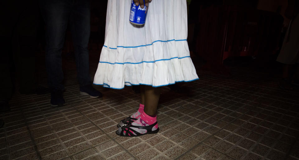 Mexican cattle farmer and part time long distance runner Maria Lorena Ramirez,22, stands in sandals before competing in the Ultra category of the Cajamar Tenerife Bluetrail 2017, a 97km mountain race held over 23 hours across the Island starting from sea level up to 3,555 meters on the Spanish Canary island of Tenerife, on June 9, 2017. Lorena Ramirez, who competes in sandals and traditional garb had to be evacuated by helicopter due to severe knee pain and her brother finished the race which crosses the El Teide national park. / AFP PHOTO / DESIREE MARTIN        (Photo credit should read DESIREE MARTIN/AFP/Getty Images)