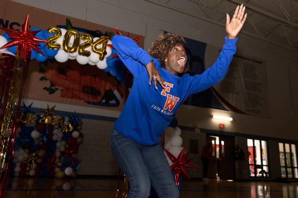 Olympic gold medalist Dawn Harper-Nelson dances as she arrives at the Winning in Life event at the Jackie Joyner-Kersee Community Center in East St. Louis, Ill. on April 12, 2024. The event came prior to a track meet the next day and speakers discussed mindsets and athletic professionalism. “If I ever feel nervous before a race starts,” Harper-Nelson said, “I just remind myself that I put in the work. I deserve to be here.” Joshua Carter/Belleville News-Democrat