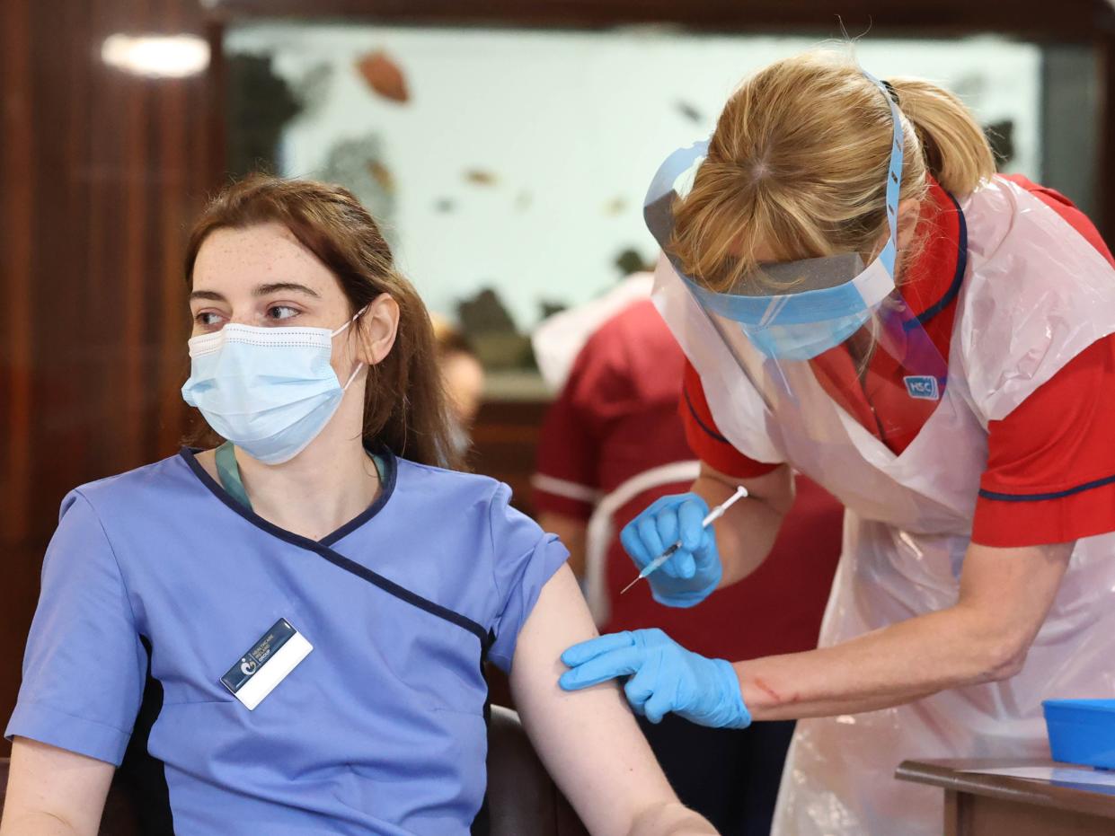 Care home staff receive Pfizer/BioNTech Covid-19 vaccine (Liam McBurney/PA)