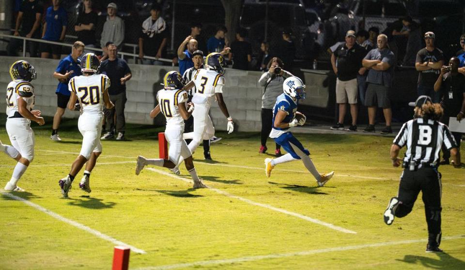 Ripon Christian’s Trevor Van Elderen scores a touchdown run during the Southern League game with Orestimba in Ripon, Calif., Friday, Sept. 22, 2023.