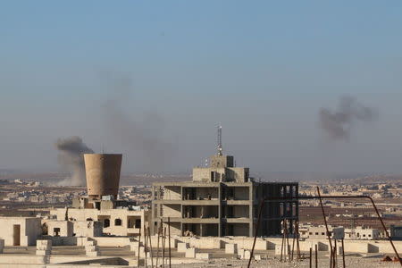 Smoke rises after airstrikes by pro-Syrian government forces in Anadan city, about 10 kilometers away from the towns of Nubul and Zahraa, Northern Aleppo countryside, Syria February 3, 2016. REUTERS/Abdalrhman Ismail