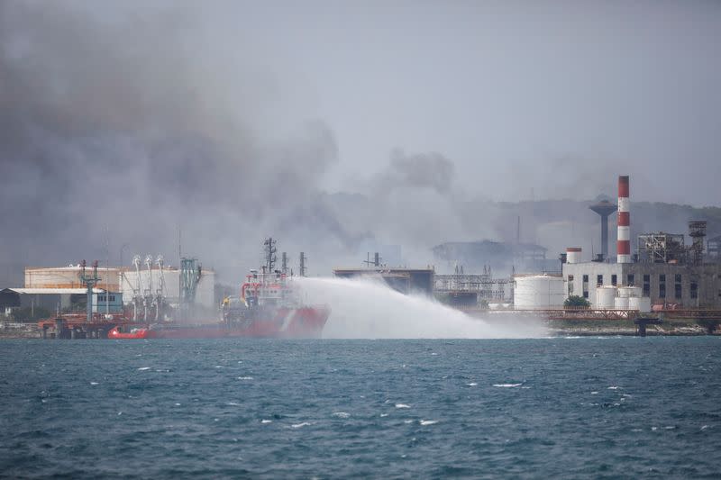 FILE PHOTO: Major fire spreads at Cuban fuel storage facility hit by lightning