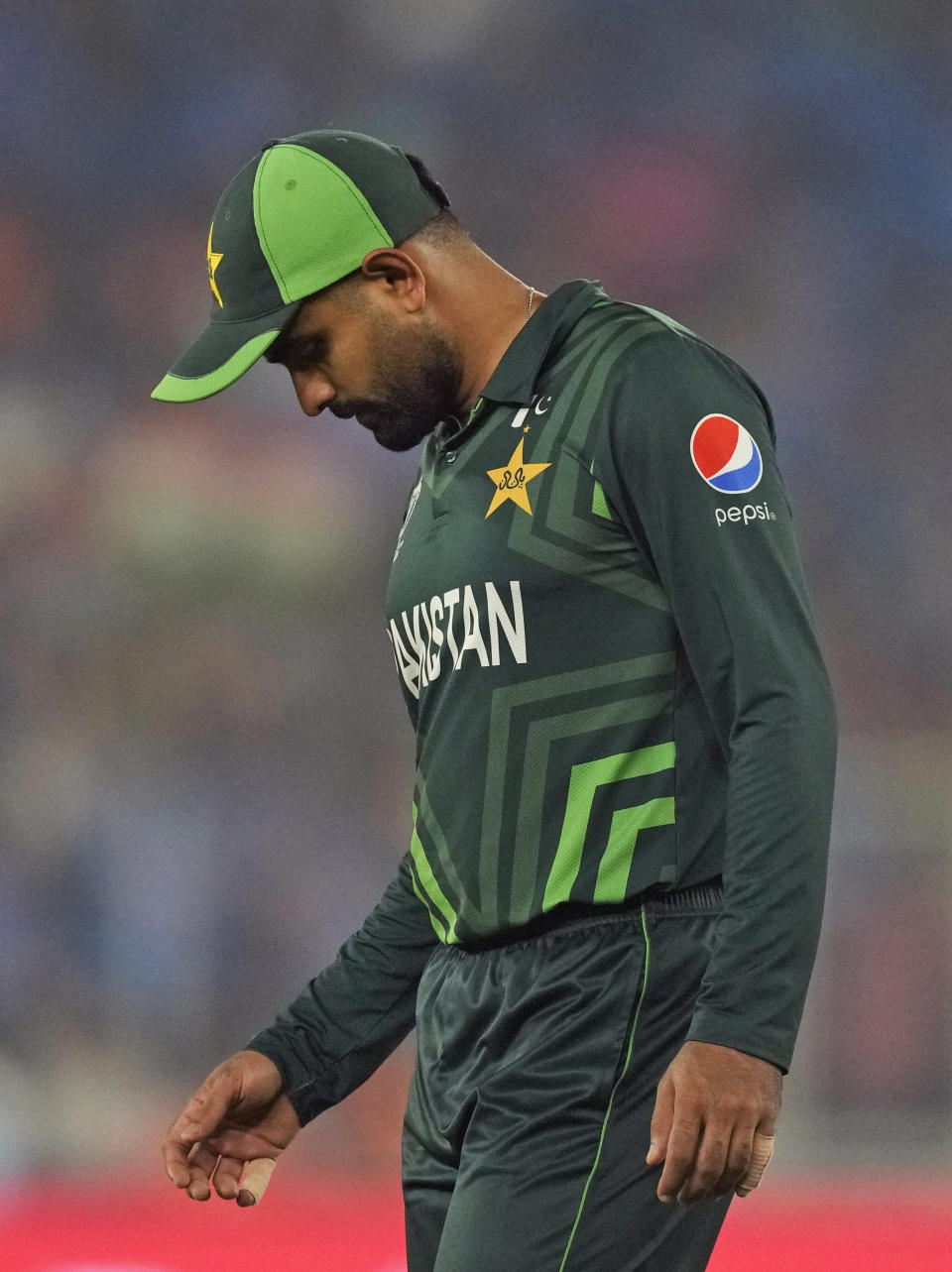 Pakistan's captain Babar Azam reacts in the field during the ICC Men's Cricket World Cup match between India and Pakistan in Ahmedabad, India, Saturday, Oct. 14, 2023. (AP Photo/Ajit Solanki)