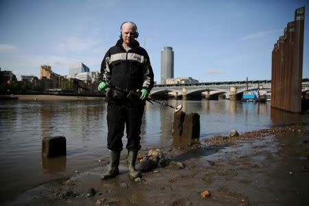 Mudlark Matthew Goode poses for a portrait on the bank of the River Thames in London, Britain May 22, 2016. REUTERS/Neil Hall