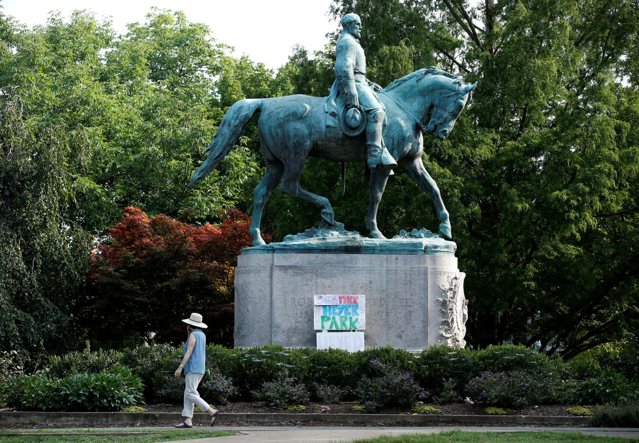 A sign on the statue of Gen. Robert E. Lee calls for the park to be renamed for Heather Heyer, who was killed at in a far-right rally, in Charlottesville, Virginia, U.S., Aug. 16, 2017. REUTERS/Joshua Roberts (Photo: Joshua Roberts / Reuters)