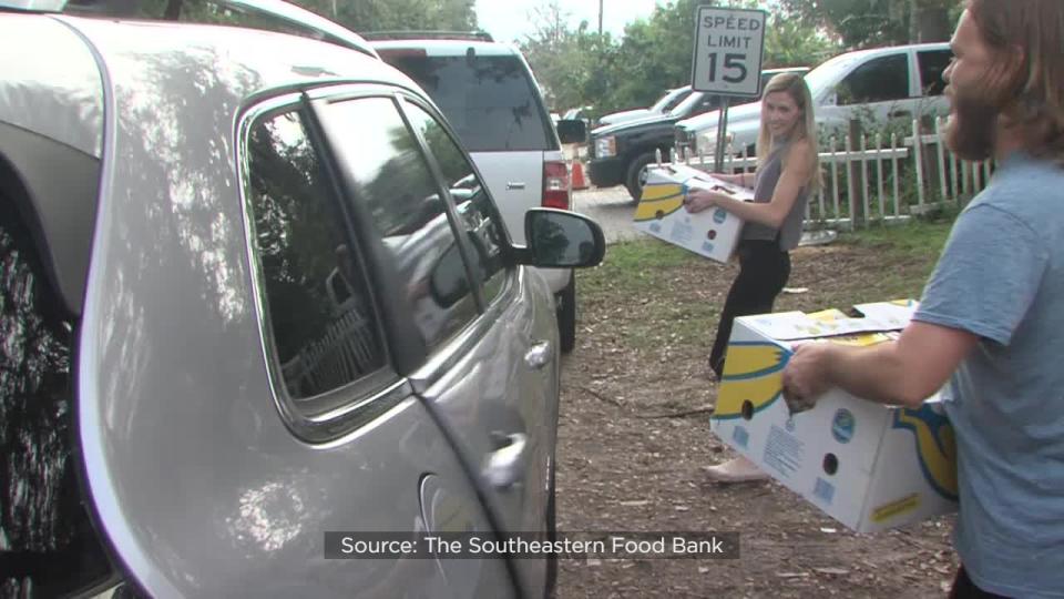 Hundreds of volunteers spent Thanksgiving morning giving back to families in need throughout West Orange County.