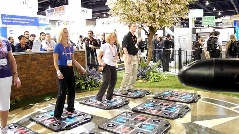 The 2013 Consumer Electronics Show includes a zone on fitness and health, pictured on January 9, 2012, with a variety of gadgets and services, including a heart monitoring app from Polar, a helmet cam for skiers from Geonaute, Fitbug's fitness monitor, and a game to help encourage exercise developed by United HealthCare