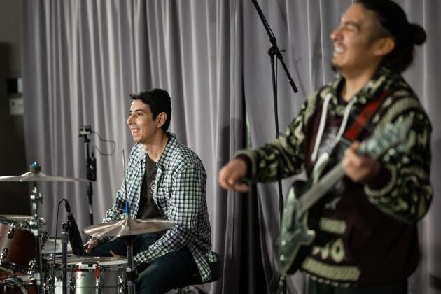 Brain tumor survivors Adrian Rivas (left) and Robert Alvarez play music together after meeting for the first time. - Credit: The University of Texas MD Anderson Cancer Center