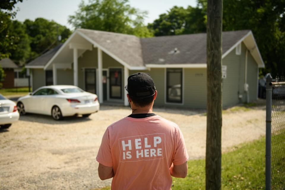 An anti-abortion demonstrator, Michael, who didn't want to give his last name, stands outside the Carolina Women's Clinic and speaks on a microphone offering patients inside free assistance on Tuesday, May 3, 2022, on Gillespie Street in Fayetteville.