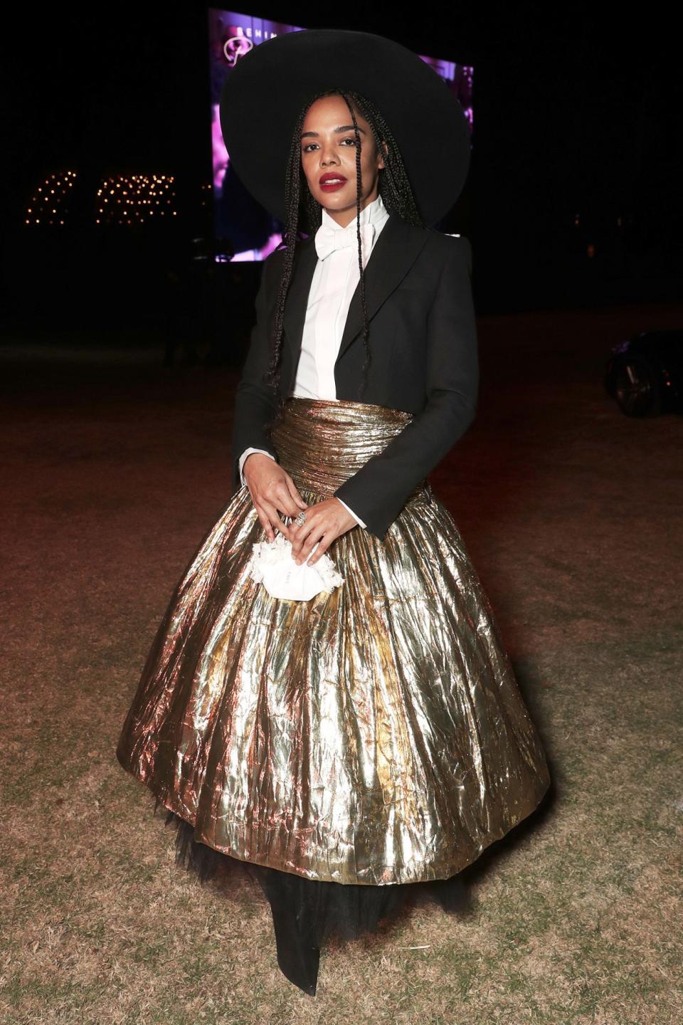 <p>Tessa Thompson strikes a pose at the Amazon Studios <em>Sylvie's Love</em> drive-in premiere at Calamigos Ranch in L.A. on Sunday.</p>