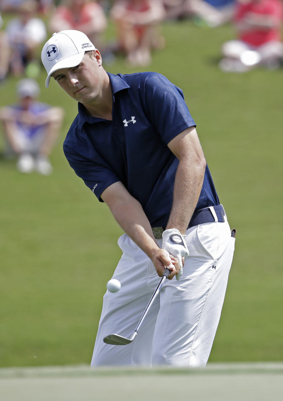 Jordan Spieth chips onto the third green during the third round of The Players championship golf tournament at TPC Sawgrass, Saturday, May 10, 2014, in Ponte Vedra Beach, Fla. (AP Photo/Lynne Sladky)