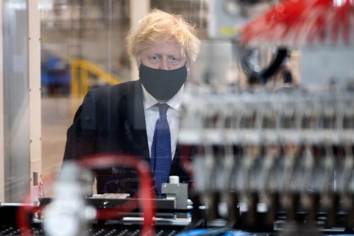 Britain's Prime Minister Boris Johnson gestures during a visit to the UK Battery Industrialisation Centre in Coventry, central England on July 15, 2021.






West Midlands.
15th July 2021 (Photo by David Rose / POOL / AFP) (Photo by DAVID ROSE/POOL/AFP via Getty Images)