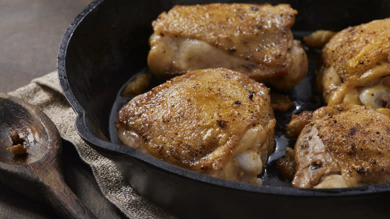 bone-in chicken thighs in skillet