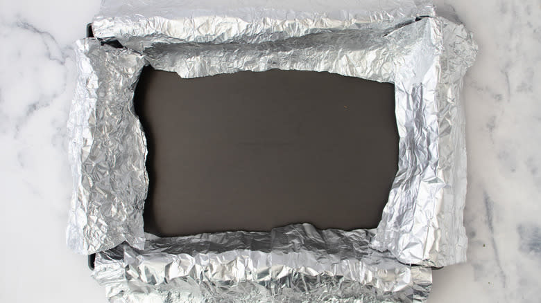 pan with edges covered in foil