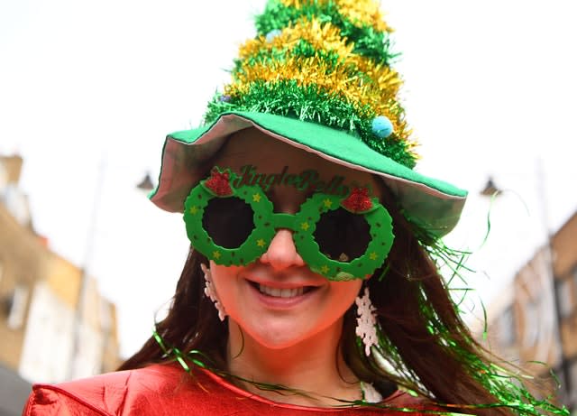 Woman with Christmas-themed hat