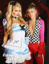 <p>Hilton and Richie 2.0 were out together in force once again. While the iconic socialite, 35, showed off her gams as a risqué Alice in Wonderland at the <i>Treats</i> party, Nicole’s little sis, 18, made a race car ensemble sexy, by lowering the zipper to engine-starting levels. (Photo: Gabriel Olsen/WireImage) </p>