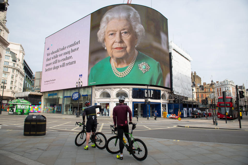 File photo dated 8/4/2020 of an image of Queen Elizabeth II and quotes from her broadcast on Sunday to the UK and the Commonwealth in relation to the coronavirus epidemic are displayed on lights in London's Piccadilly Circus. The Queen celebrates her 94th birthday on Tuesday.