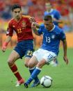 Italian midfielder Emanuele Giaccherini (R) vies with Spanish midfielder Jesus Navas during the Euro 2012 championships football match Spain vs Italy on June 10, 2012 at the Gdansk Arena. AFP PHOTO / CHRISTOF STACHECHRISTOF STACHE/AFP/GettyImages