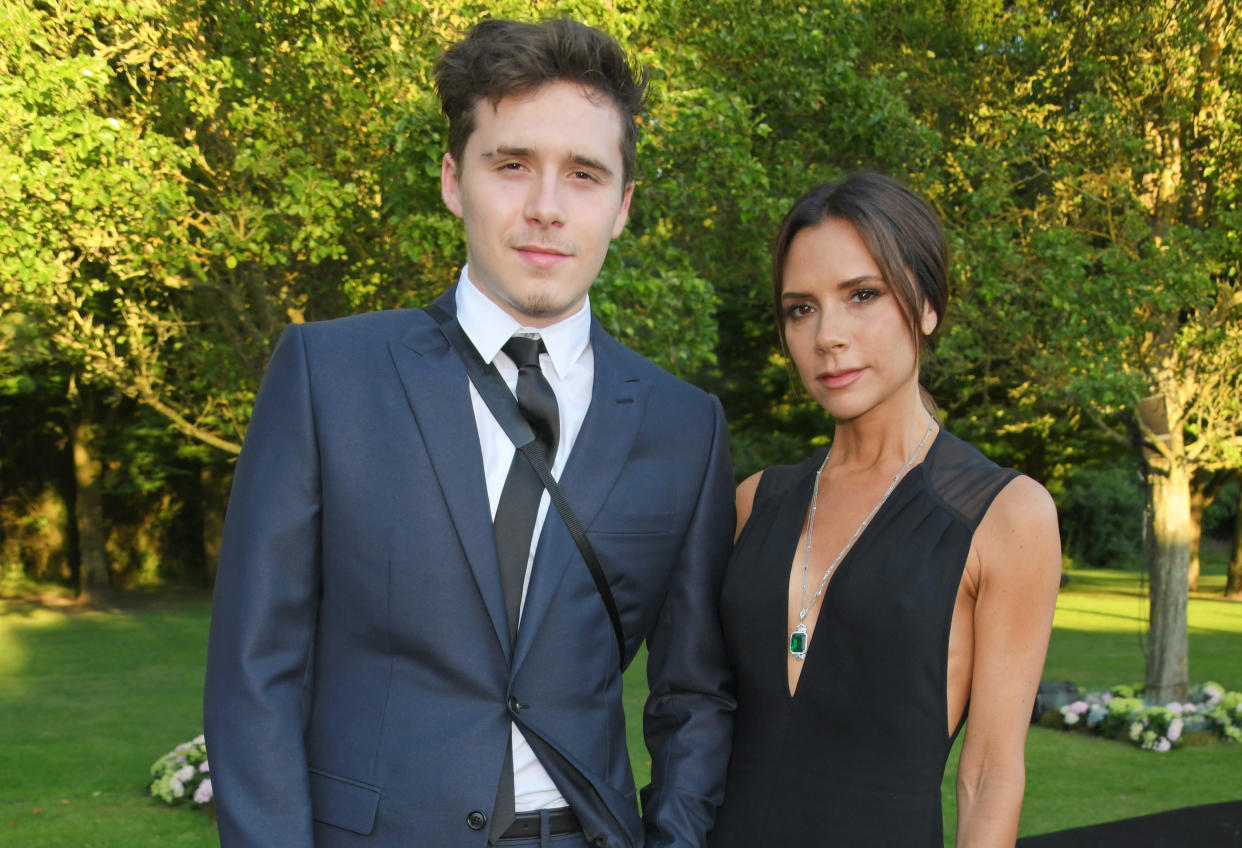 Victoria and Brooklyn Beckham [Photo: Getty]