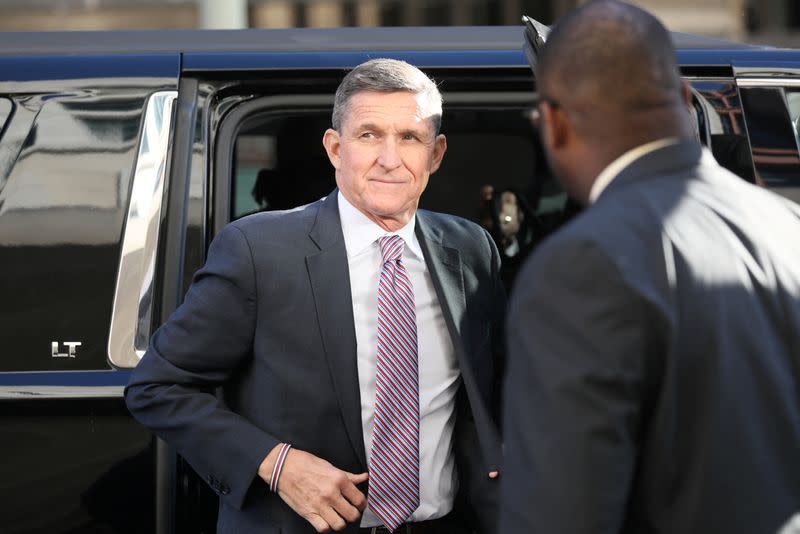 FILE PHOTO: Former national security adviser Flynn arrives for sentencing hearing at U.S. District Court in Washington