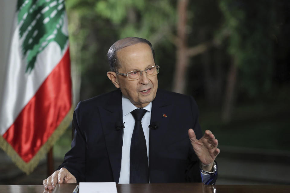 In this photo provided by Lebanon's official government photographer Dalati Nohra, Lebanese President Michel Aoun speaks during a TV interview at the presidential palace, in Baabda, east of Beirut, Lebanon, Tuesday, Nov. 12, 2019. Aoun said it could still take days to set a date for consultations with heads of parliamentary blocs for the naming of a new prime minister and added that the best option is for the new Cabinet to include both politicians and technocrats. (Dalati Nohra via AP)