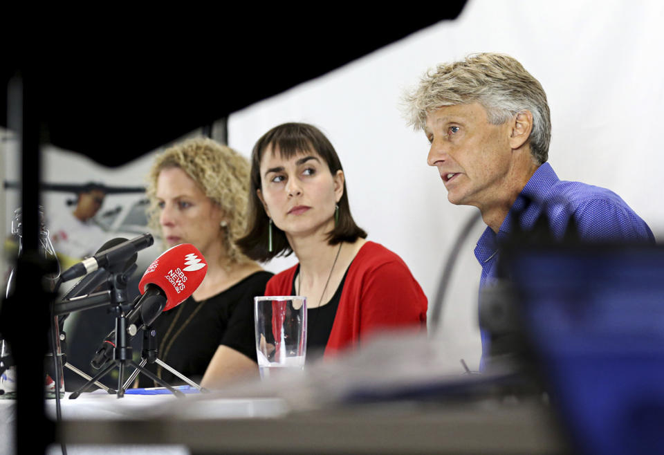 Australia executive director Paul McPhun, right, speaks along with other Medecins Sans Frontieres (Doctors Without Borders) Christine Ruffler, left, and Beth O'Connor during a press conference in Sydney, Thursday, Oct. 11, 2018. Humanitarian medical professionals expelled from Nauru said on Thursday asylum seekers that Australia had banished to the tiny Pacific atoll were suicidal and their children have lost hope. The Nauru government forced Doctors Without Borders out of the country last week, abruptly ending their free medical care for asylum seekers refugees and local Nauruans. (Danny Casey/AAP Image via AP)