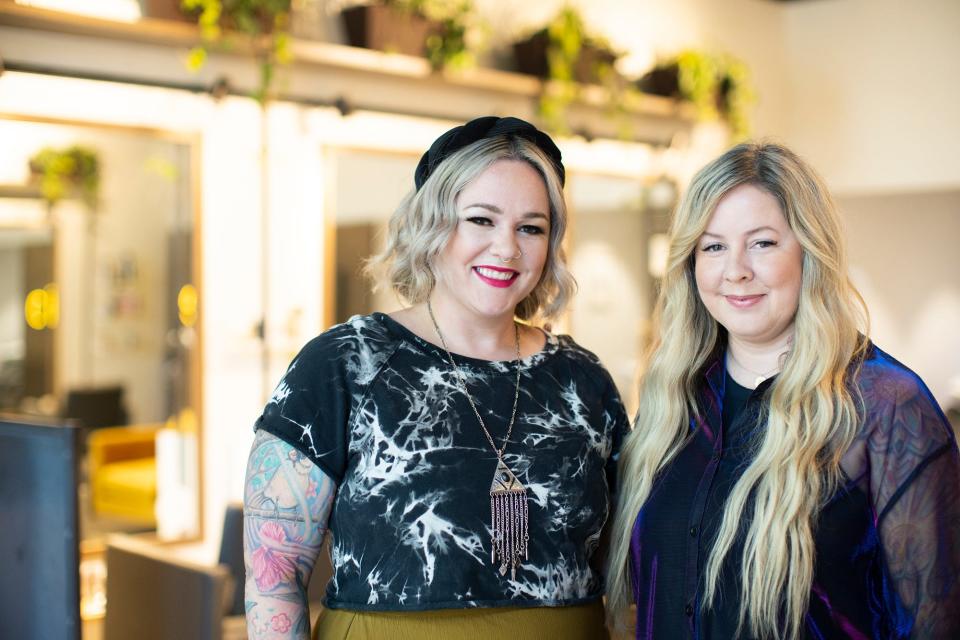 Meghann DeWees, right, and Lizzy Doke, left, are owners of Citrine Hair and Skin in Franklinton, which is part of the international "Strands for Trans" network.