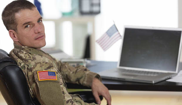 American Soldier in his office