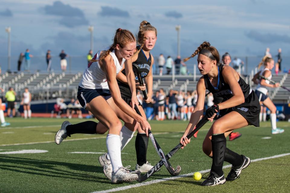 Central Bucks East's Paige Keller comes up against Quakertown's Kiera Gallagher in a first-round District One Class 3A playoff game, on Monday, October 25, 2021. The Patriots shut out the Panthers, 3-0.