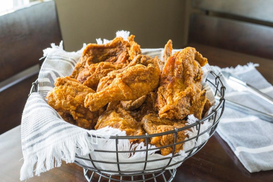 Share a basket of fried chicken at Modern Southern Table in Budd Dairy Food Hall.