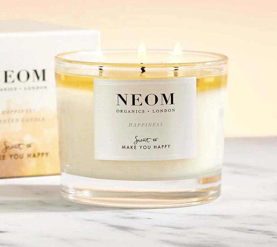 A photo of Neom Happiness Scented 3 Wick Candle.