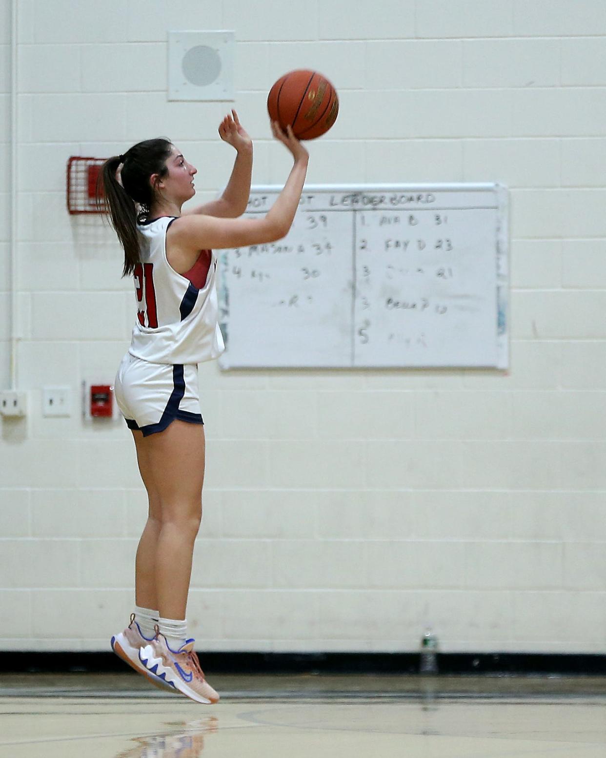 Pembroke's Alissa Marcella rises up for a three pointer to give Pembroke the 16-15 lead over Quincy during second quarter action of their game against Quincy at Pembroke High on Tuesday, Feb. 7, 2023. 