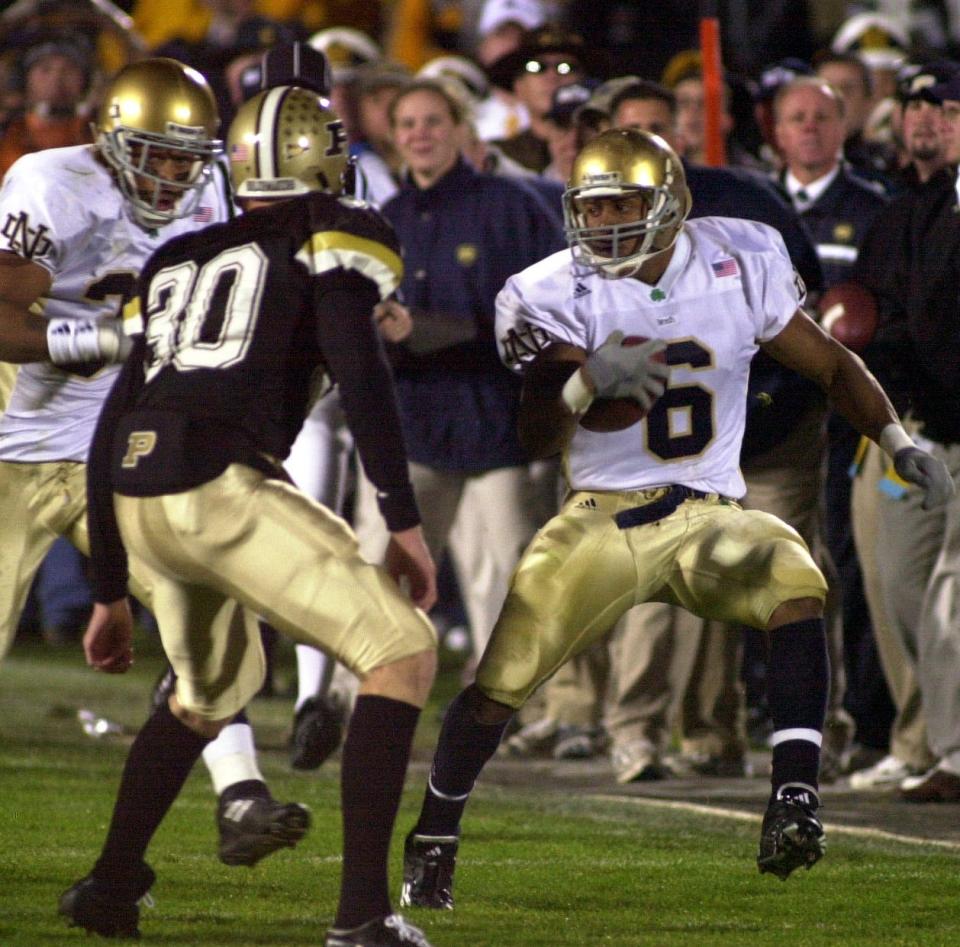 Notre Dame's David Givens (6) looks for an opening against Purdue in this 2001 file photo