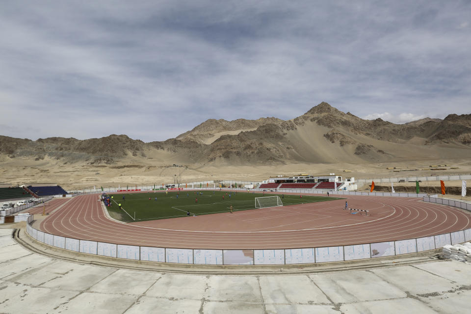 Players participate in “climate cup” a first of its kind “climate-friendly” soccer tournament on the outskirts of Leh, Ladakh, India, Tuesday, Sept.5, 2023. The organizers say the matches are first in Asia to be held at an altitude of 11,000 feet, about 3,350 meters, and with a minimum carbon footprint. Ladakh is an ecologically fragile territory where oxygen is thin, and breathing is hard. (AP Photo/Stanzin Khakyab)