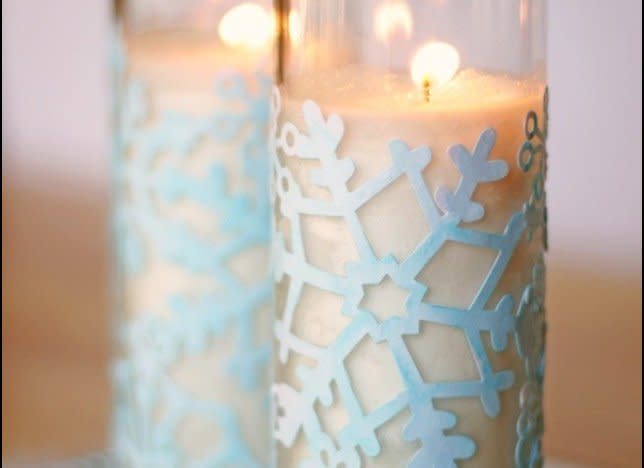 Relish the last few weeks of winter with these <a href="http://www.huffingtonpost.com/2013/02/15/diy-snowflake-votive_n_2669265.html?utm_hp_ref=crafts" target="_hplink">charming snowflake votives</a>.