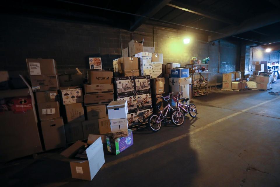 Household items and kids' toys displayed inside a donation warehouse for Team Rubicon in Milwaukee. The disaster relief organization has been managing donations to Afghan evacuees at military bases.