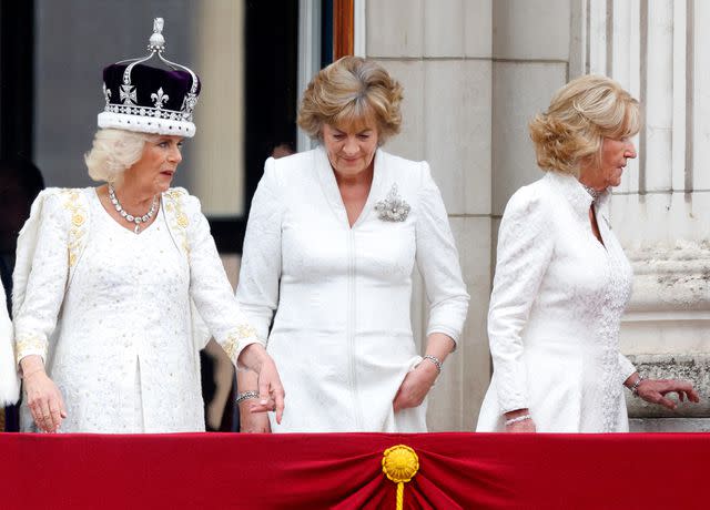 <p>Max Mumby/Indigo/Getty</p> Queen Camilla, Fiona Petty-Fitzmaurice and Annabel Elliot on the balcony of Buckingham Palace following the May 6 coronation ceremony.