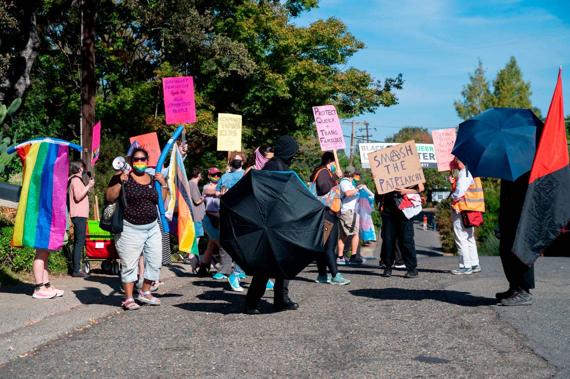 LGBTQ activists counter-protested a parents’ rights “War on Children” rally near Gov. Gavin Newsom’s home in Fair Oaks on Saturday. Lezlie Sterling/lsterling@sacbee.com