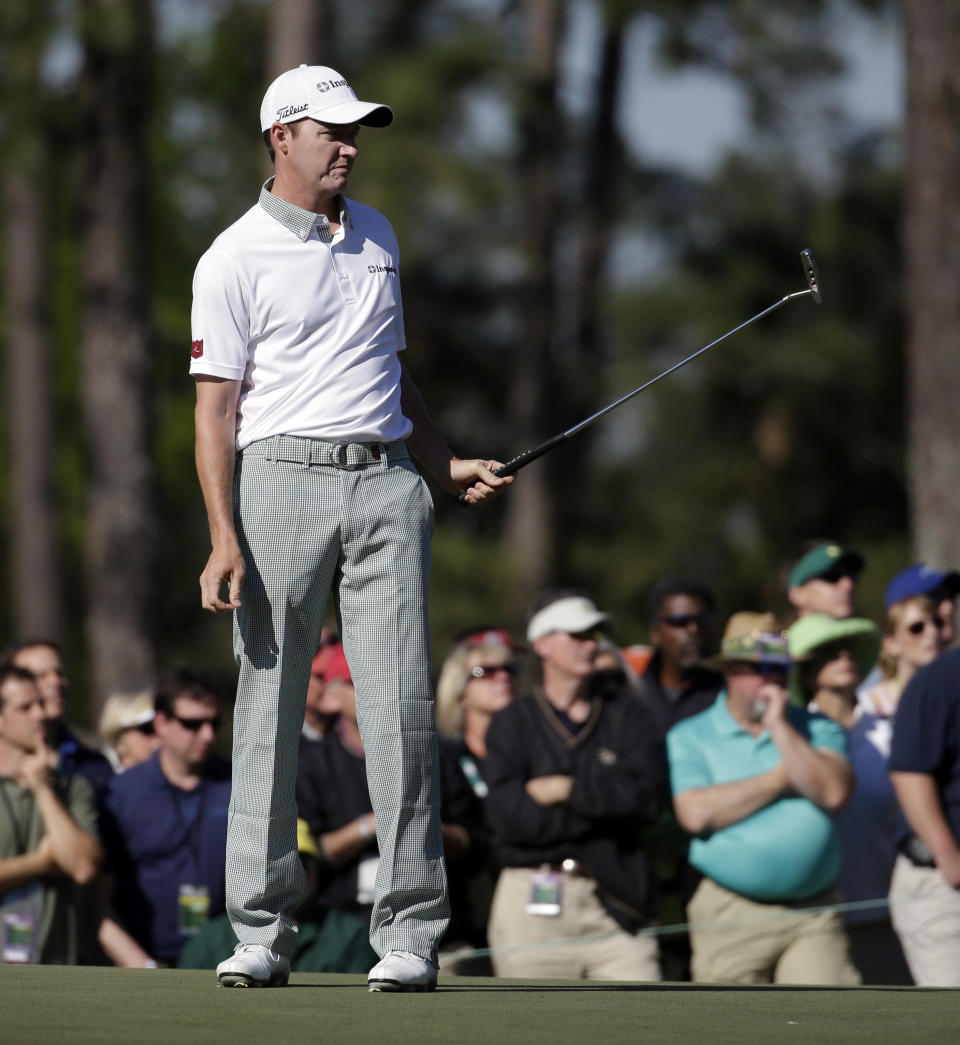 Jimmy Walker watches his putt on the first green during the first round of the Masters golf tournament Thursday, April 10, 2014, in Augusta, Ga. (AP Photo/Darron Cummings)