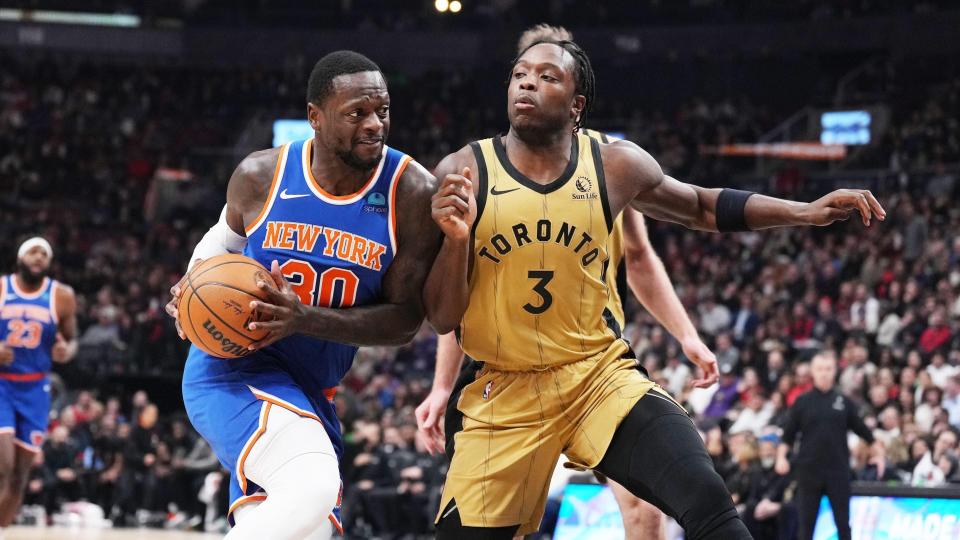 Dec 1, 2023; Toronto, Ontario, CAN; New York Knicks forward Julius Randle (30) controls the ball as Toronto Raptors forward O.G. Anunoby (3) tries to defend during the first quarter at Scotiabank Arena.