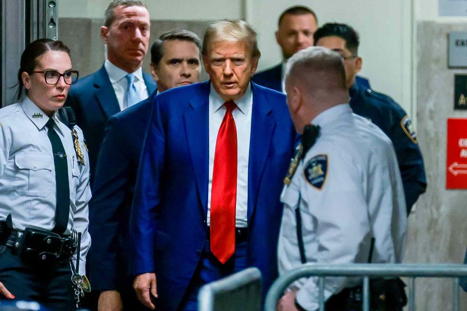 <p>JUSTIN LANE/POOL/AFP via Getty</p> Donald Trump arrives for a hearing at Manhattan Criminal Court on March 25, 2024