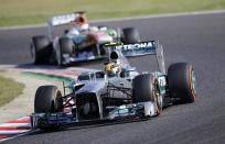 Mercedes Formula One driver Lewis Hamilton of Britain, followed by Force India Formula One driver Paul di Resta of Britain, drives during the qualifying session of the Japanese F1 Grand Prix at the Suzuka circuit October 12, 2013. REUTERS/Issei Kato (JAPAN - Tags: SPORT MOTORSPORT F1)