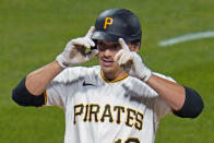 Pittsburgh Pirates' Bryan Reynolds crosses home plate after hitting a two-run home run off St. Louis Cardinals starting pitcher Daniel Ponce de Leon during the fifth inning of the second baseball game of a doubleheader in Pittsburgh, Friday, Sept. 18, 2020. (AP Photo/Gene J. Puskar)