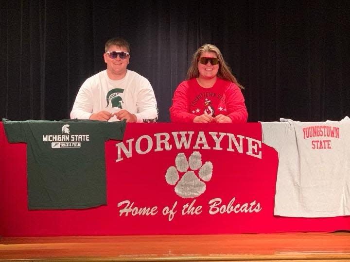 Norwayne's Colby Morlock and Grace Sparks are all smiles after signing their letters of intent to Michigan State University and Youngstown State University.